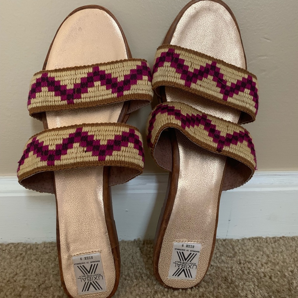 Uxibal slip on sandals